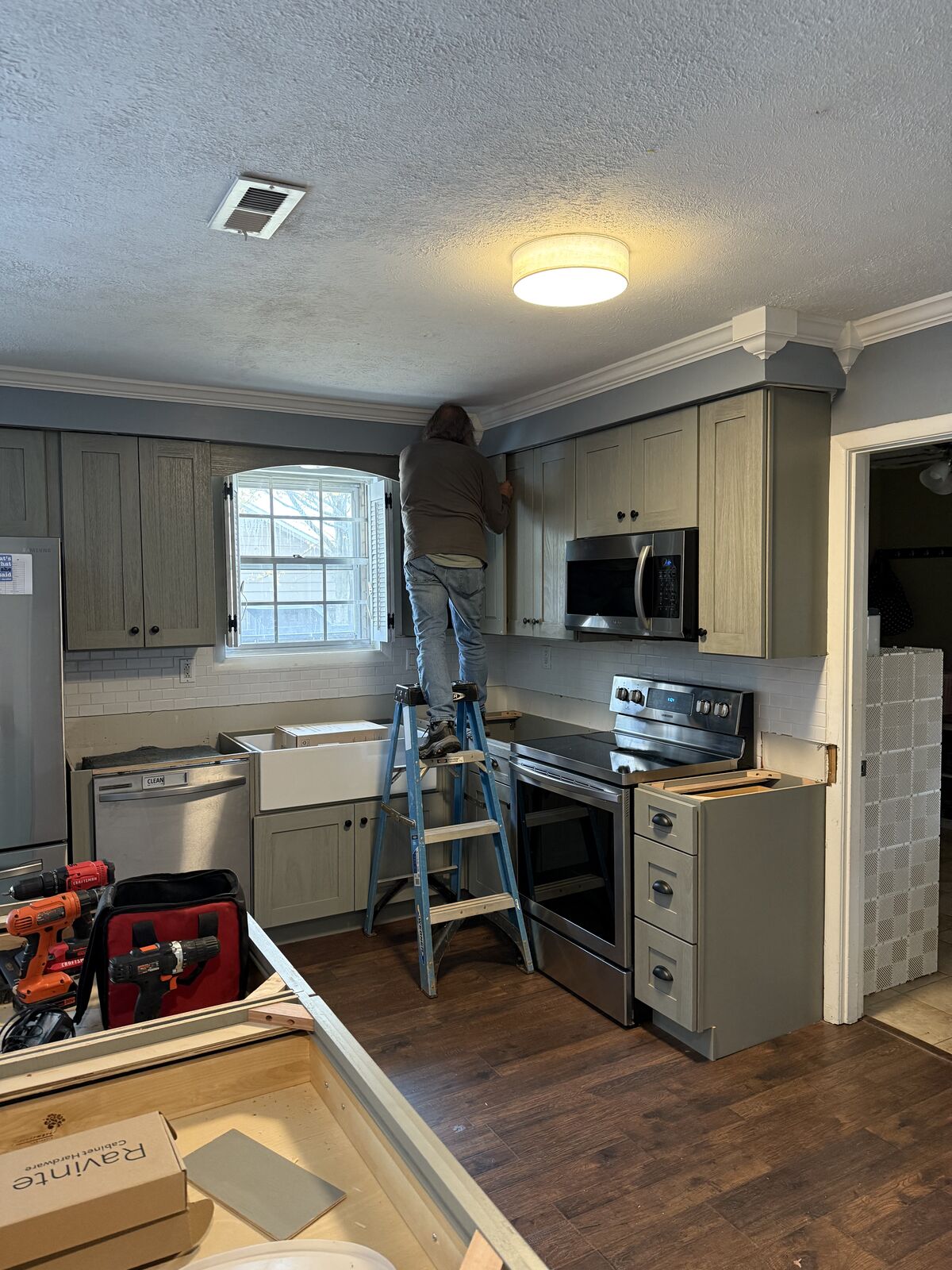 Kitchen remodel in Columbus, GA: new shaker cabinets around a farmhouse sink