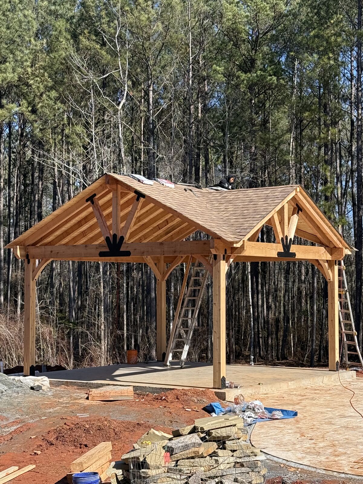 Timber-frame pavilion with heavy trusses and a new shingle roof in Harris County, GA